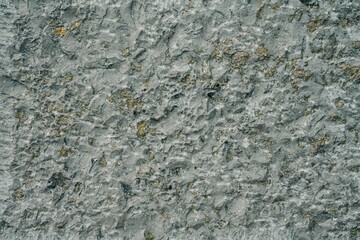 Mur en pierre texturé gris