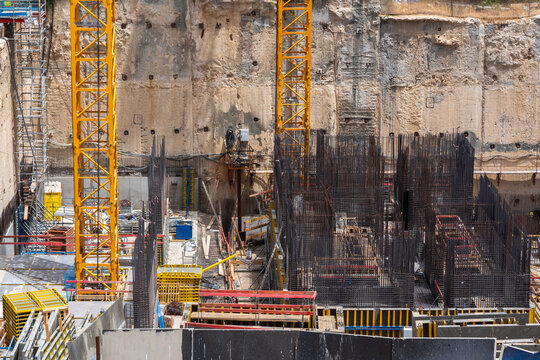 Construction site background. Hoisting cranes and new multi storey buildings. Industrial background. Close Up of Somail complex in Tel Aviv. Construction work on the new Tel Aviv Municipality building