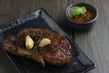 lamb chops on a wooden table