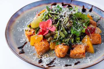 salad of fruits and vegetables with herbs. on a white background