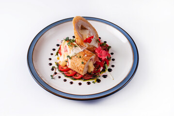 meatloaf with cheese filling and tomatoes. on a white background