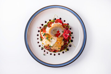 meatloaf with cheese filling and tomatoes. on a white background