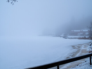frozen lake with fog