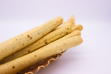 Breadsticks on light background