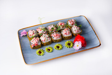 Sushi menu. Japanese food. Sushi rolls with soy sauce on a white background