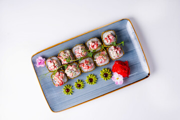 Sushi menu. Japanese food. Sushi rolls with soy sauce on a white background