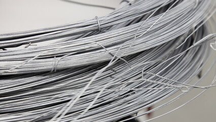 Lashing wires skeins close-up - metal production storage warehouse