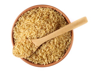 Integral uncooked rice pile in clay pot and wooden spoon isolated on white, top view  