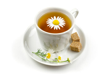 Tea (infusion, decoction) from chamomile medicinal (pharmacy) field in a cup on a saucer on a white isolated background. Herbal medicine, medicinal herb Matricaria.