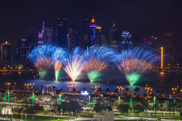 Obraz na płótnie Canvas Fireworks at Qatar Natioanl Day at corniche Doha