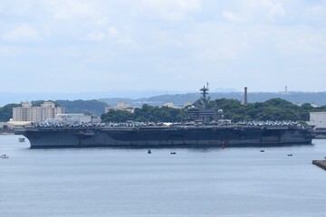 United States Navy USS Abraham Lincoln (CVN-72), Nimitz-class aircraft carrier departing from Yokosuka Port.