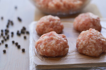 minced meat with rice balls cutlets blanks scattered peppers close up