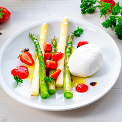 Burrata cheese with asparagus and strawberries