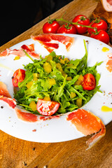 Rocket salad with dried Spanish ham