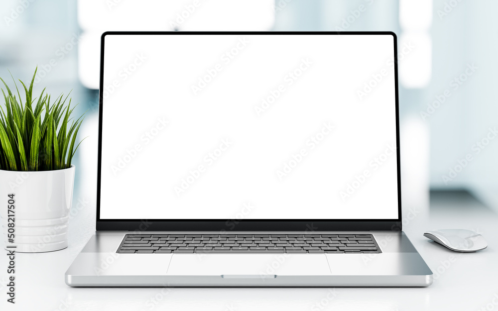 Canvas Prints a modern frameless laptop on a table with grass flowers and a mouse - blank screen and soft bright b