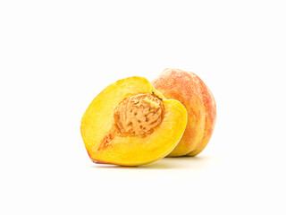 Group of fresh peaches fruit over a white background