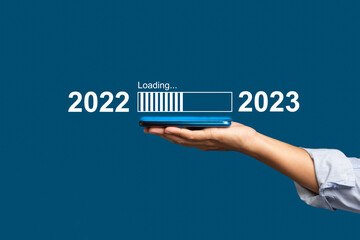 Countdown to 2023 concept. The virtual download bar with loading progress bar for New Year's Eve and changing the year 2022 to 2023 - obrazy, fototapety, plakaty