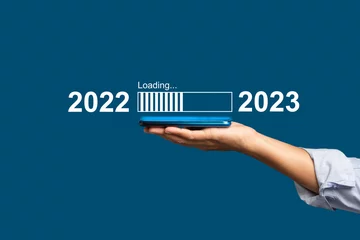 Fotobehang Countdown to 2023 concept. The virtual download bar with loading progress bar for New Year's Eve and changing the year 2022 to 2023 © meeboonstudio