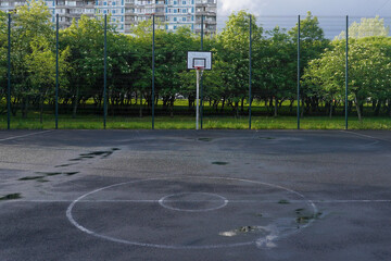 Basketball court with hoop in a public park in the city