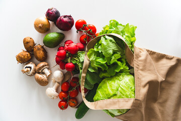 Eco friendly natural textile bag with organic vegetables. Top view