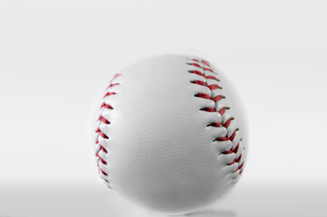 A Closeup of a Baseball in a White Background