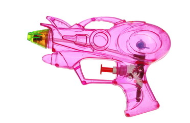 Plastic transparent water gun isolated on white