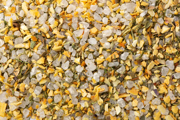 Spices for Italian dishes, salt and herbs close-up on a white background. Dried herbs as a spice. Indian and Arabic spices for cooking. Medicinal herbs and condiment.