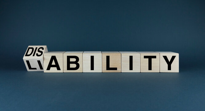 Disability - Liability. Cubes form words Disability - Liability.