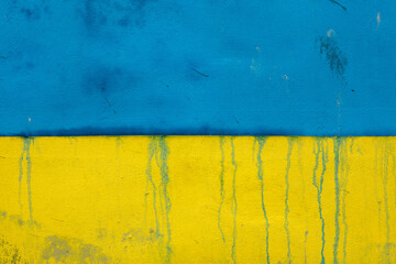 Ukrainian national flag depicted on the wall in Prague, Czech Republic. The huge flag was depicted to support Ukrainian refugees in the Czech Republic.