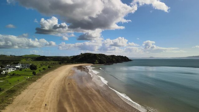 Cinematic drone flight over Coopers beach in New Zealands Doubtless bay