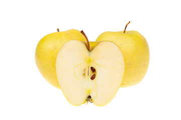 Fresh whole and sliced yellow delicious apple fruits, isolated on white background