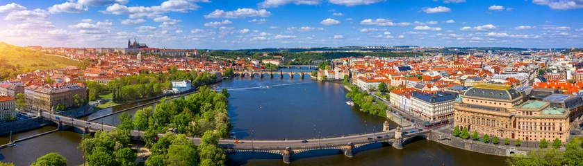 Papier Peint photo Pont Charles Scenic view of the Old Town pier architecture and Charles Bridge over Vltava river in Prague, Czech Republic. Prague iconic Charles Bridge (Karluv Most) and Old Town Bridge Tower at sunset, Czechia.