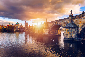 Charles Bridge in Prague in Czechia. Prague, Czech Republic. Charles Bridge (Karluv Most) and Old Town Tower. Vltava River and Charles Bridge. Concept of world travel, sightseeing and tourism.