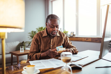 Old people, tax return and home banking. Angry senior man paying federal income taxes, doing family...