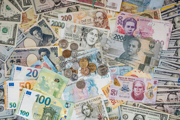 Composition with banknotes and coins of different world currencies