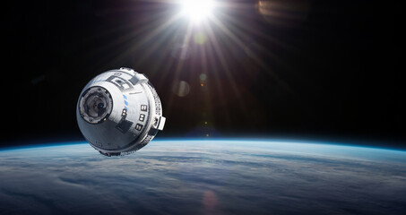 Starliner spaceship in space. Crew Space Transportation on orbit of Earth. Expedition to International space station. Elements of this image furnished by NASA