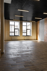 Empty open space office room with window