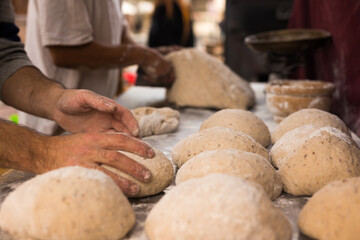 bread preparation. loaves of dough before baking