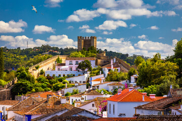 Obidos, Portugal stonewalled city with medieval fortress, historic walled town of Obidos, near...