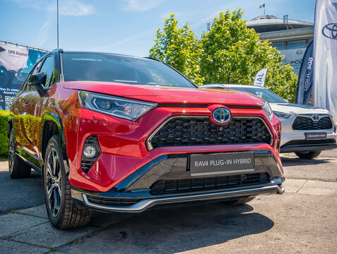 Bucharest, Romania - 05.20.2022: Close up detail with the front hood bar of the new Toyota RAV4 Plug-in-Hybrid car