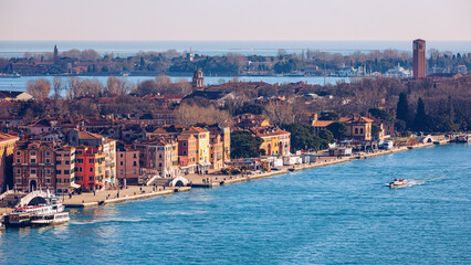 Obraz premium Venice panoramic aerial view with red roofs, Veneto, Italy. Aerial view with dense medieval red roofs of Venice, Italy