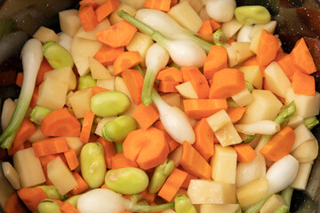 Mix of chopped vegetables in a frying pan