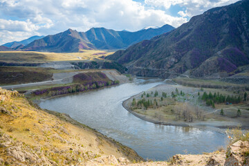 Confluence of Chuya and Katun rivers in Altai mountains, Siberia, Russia. Spring landscape. Famous...