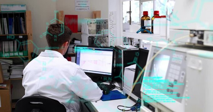 Molecular structures floating against caucasian male scientist using computer at laboratory
