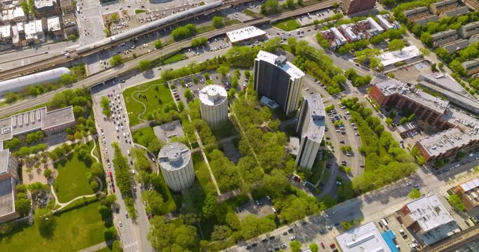 Unusual modern architecture of an amazing Chicago, Illinois. Beautiful buildings in the green trees surrounded by busy roads.