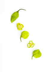 Fototapeta na wymiar fresh chili isolate on white background,slices naga chili , selective focus, top view, chili concept
