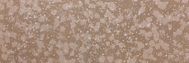 Wall surface with white splashes. For use as an abstract background. Panorama