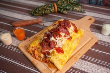 Bacon stuffed omelet
