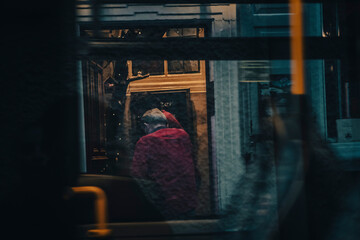 Obraz na płótnie Canvas man on the bus window