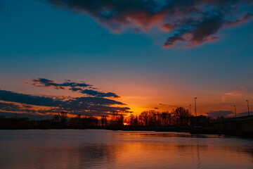 Fototapeta premium Beautiful sunset view with reflections near Plattling, Isar, Bavaria, Germany